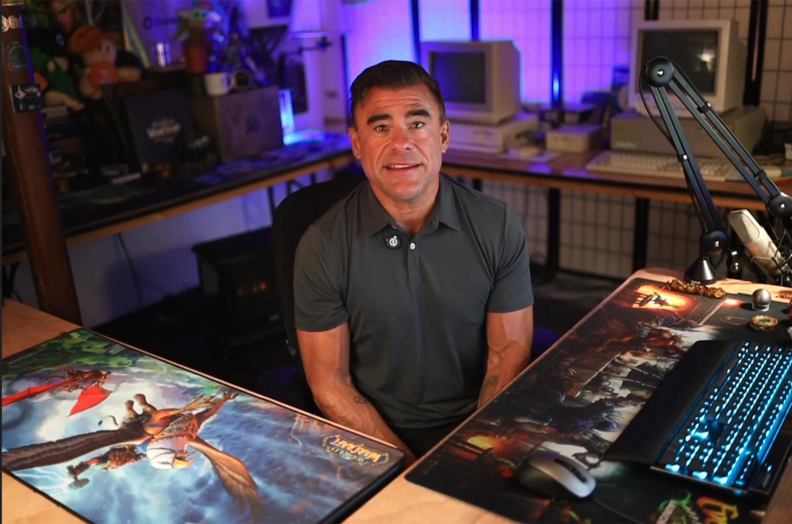 Dave Isbitski seated at a technology-filled desk during a Chainlink video recording